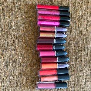 Lot of 14 liquid MAC lip colors.